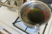Simmering the oil on the stove in a make-shift double-boiler